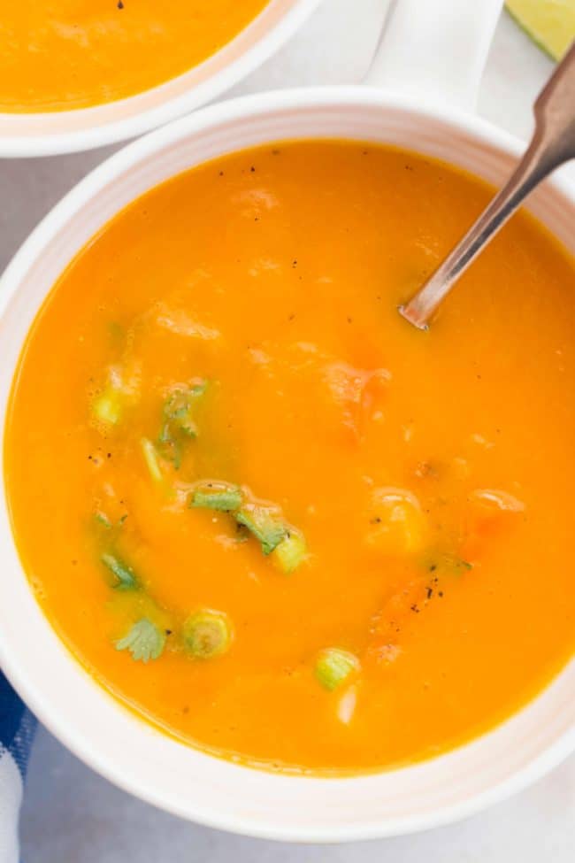 This Carrot Ginger Soup Recipe is made with carrots, celery, onion, ginger and garlic all simmered in a vegetable broth, then blended until smooth and silky