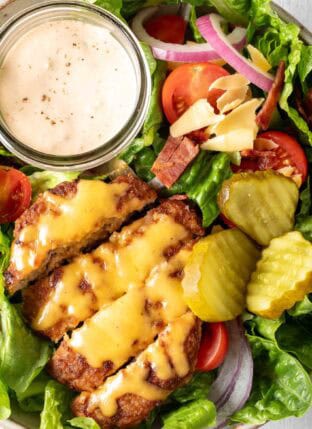 Turkey Burger Bowls filled with ground turkey, Romaine lettuce, tomatoes, onion and pickles.